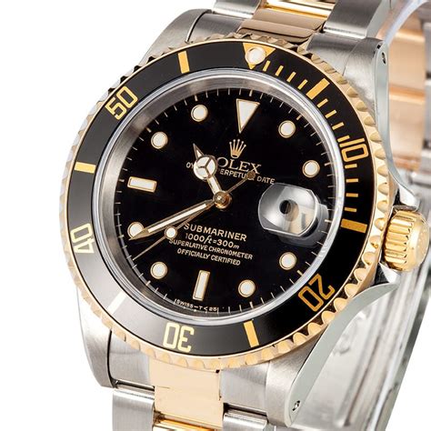 gold rolex watch with black face|gold rolex submariner black face.